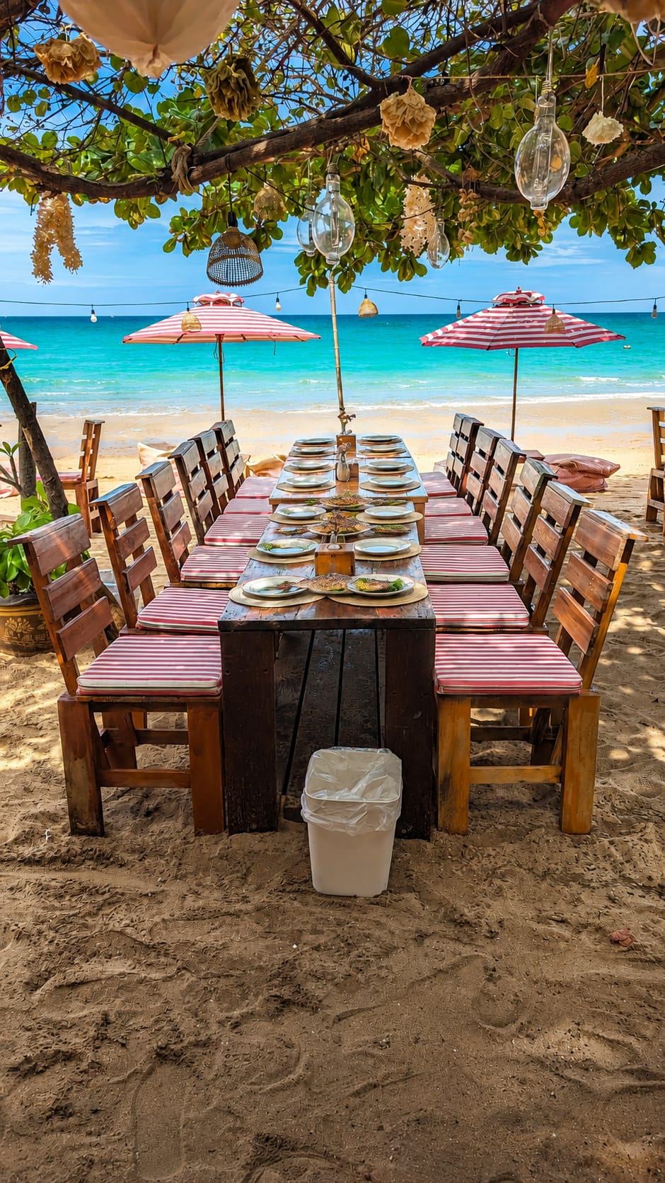 Food served at a beachfront table